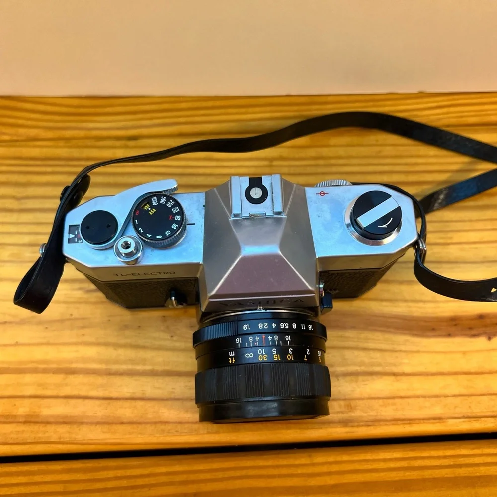 Yashica Black and Silver Film Camera with Rangefinder Design‎